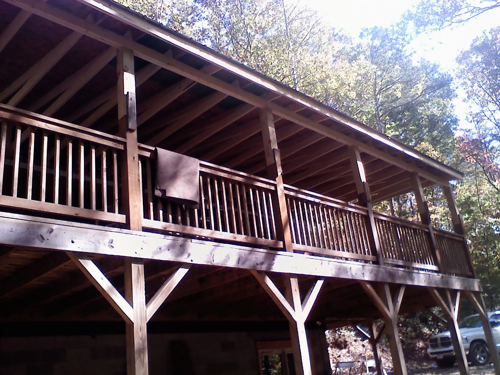Timber framing under a new elevated porch and deck — Roof Leak Repair in Votaw by Roofing Brothers